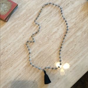 Long beaded necklace with tassel